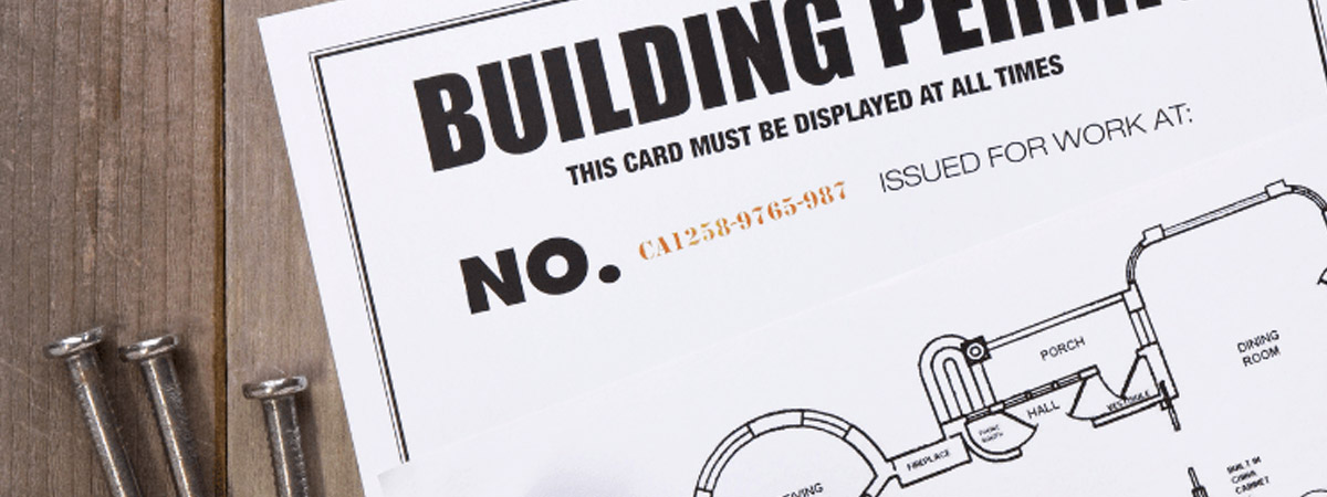 Building permit with blueprints