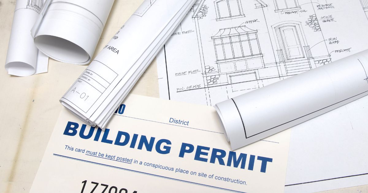 Building permit and blueprints